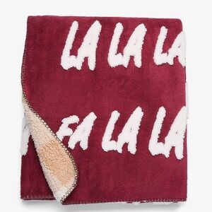 Maurices Fa La La Reversible Throw Blanket from Anthropologie